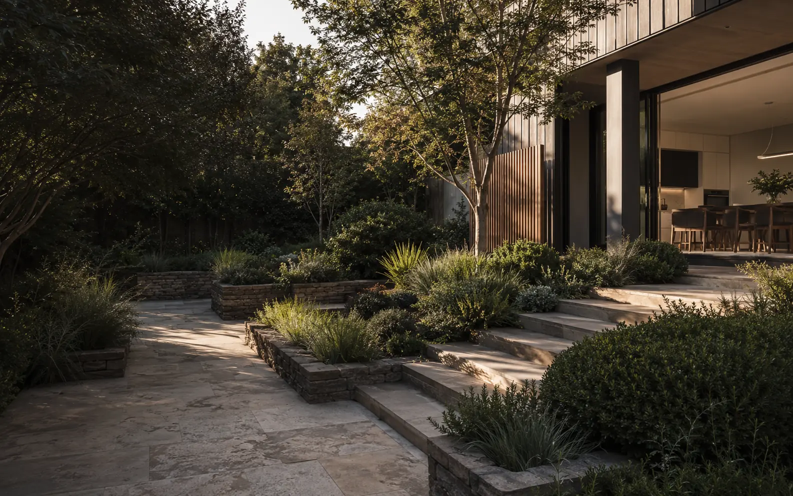 Considered residential landscape with natural stone, layered planting and timber detailing